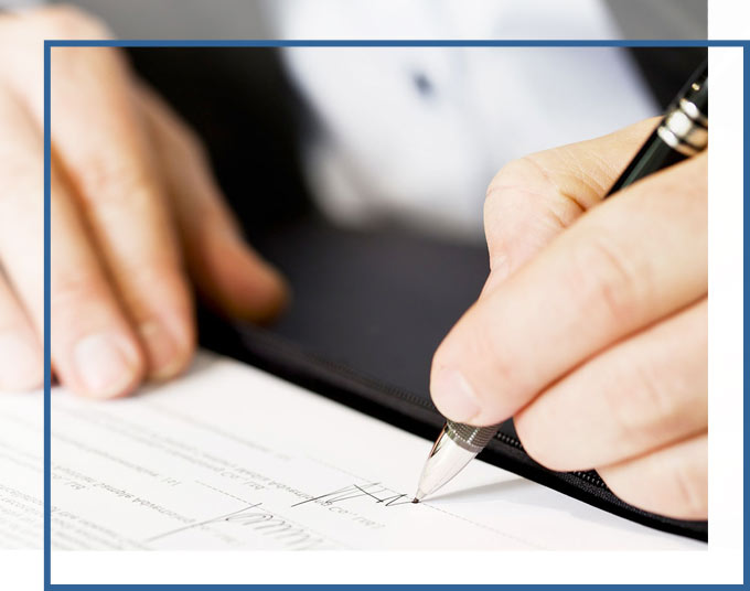 Businessman signing agreement | Business Formation Operational Document Attorneys of GD&C Law
