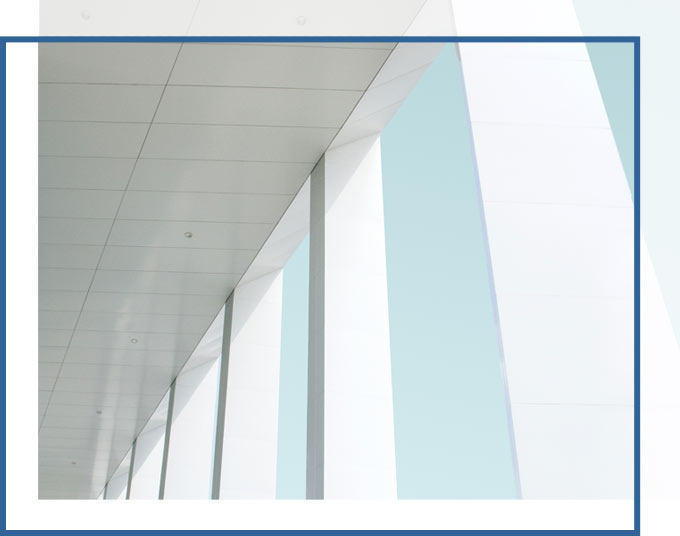 Side of building exterior modern columns | Business Mergers & Asset Acquisitions Lawyers GD&C Law